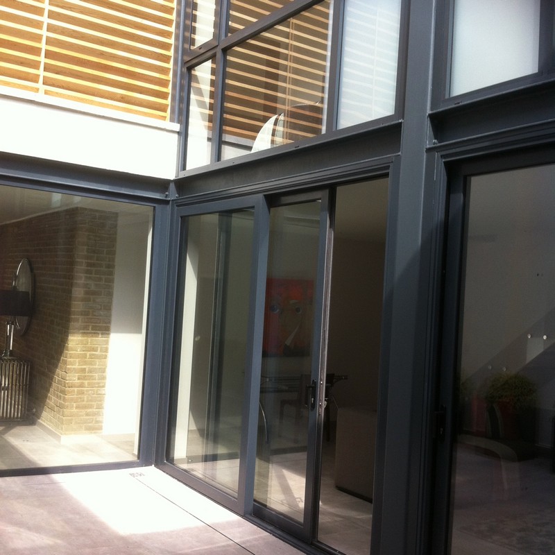 Anthracite aluminium sliding patio doors fitted in Herne Hill