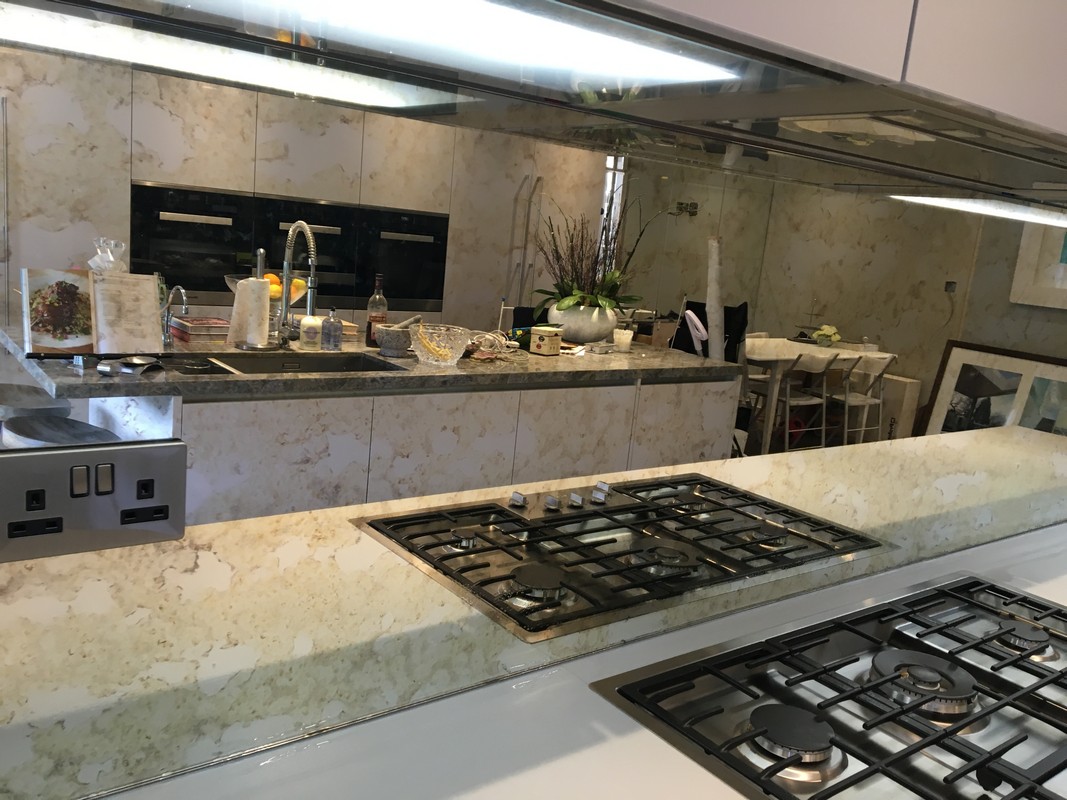 Mirror glass splashback in Herne Hill luxury kitchen